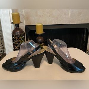 Open-toe Slingbacks in good used condition.